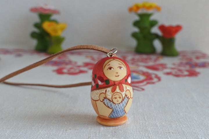 オリガ・アタジャーノワのネックレス　子守り