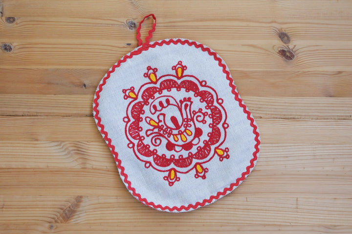 アルハンゲリスクの刺繍　なべ敷　大輪の鳥